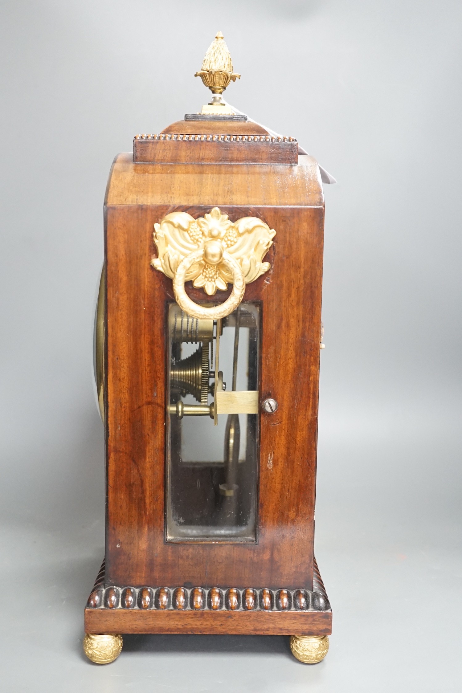 A Regency cut brass inlaid mahogany bracket timepiece by Frank Rogers, 46cm tall